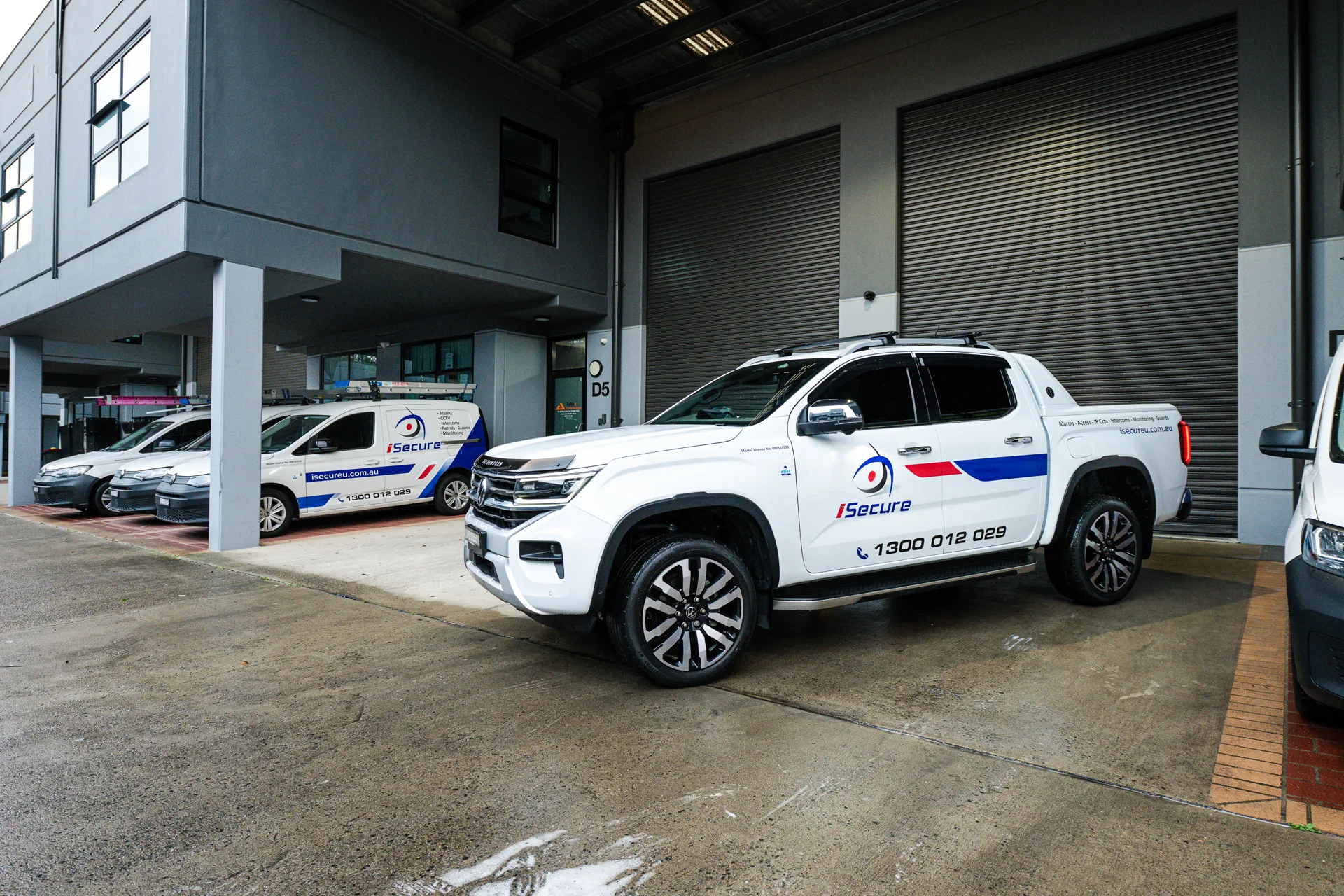 iSecure patrol vehicles parked under cover at the Kingsgrove headquarters