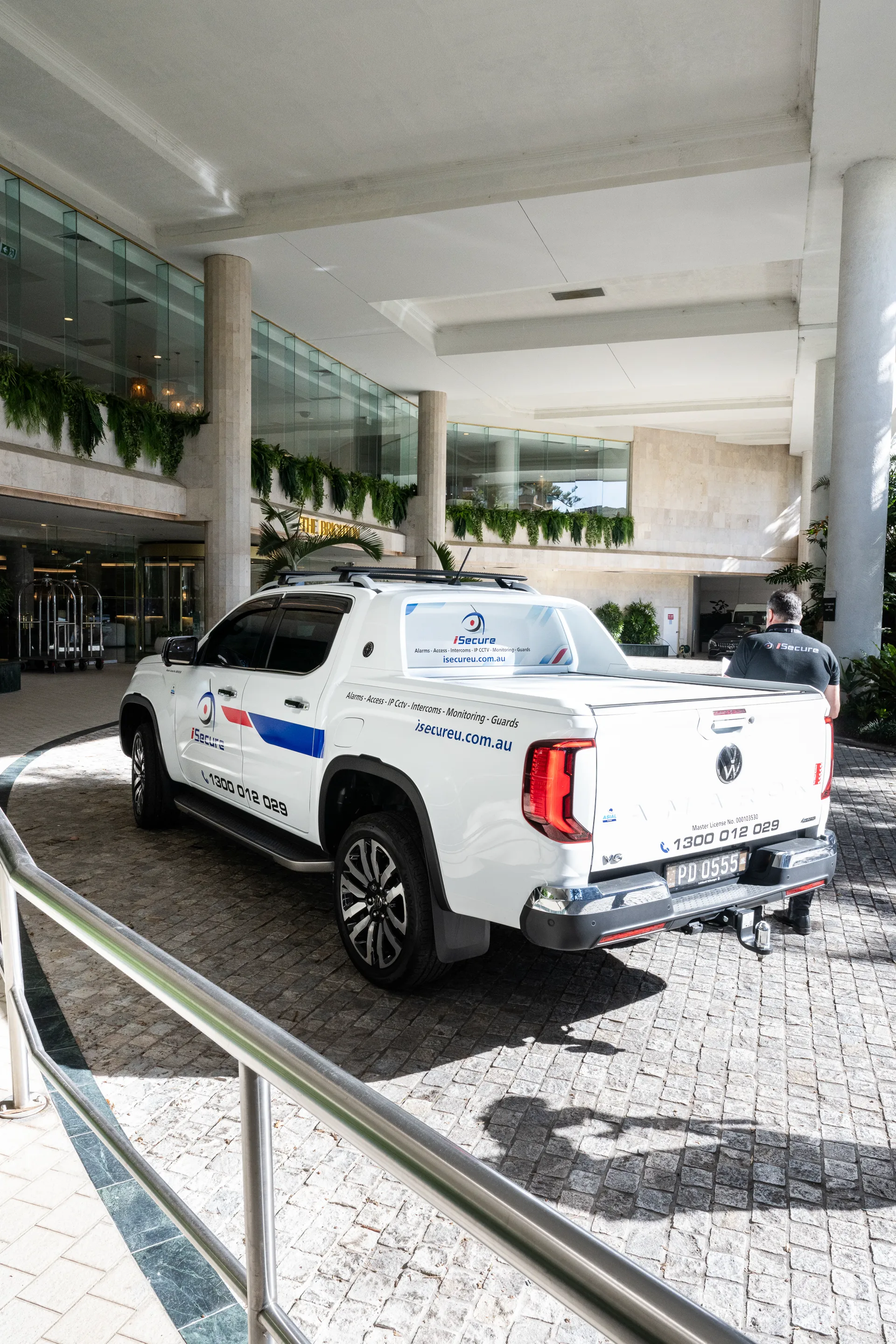An iSecure ute arriving at a hotel entrance