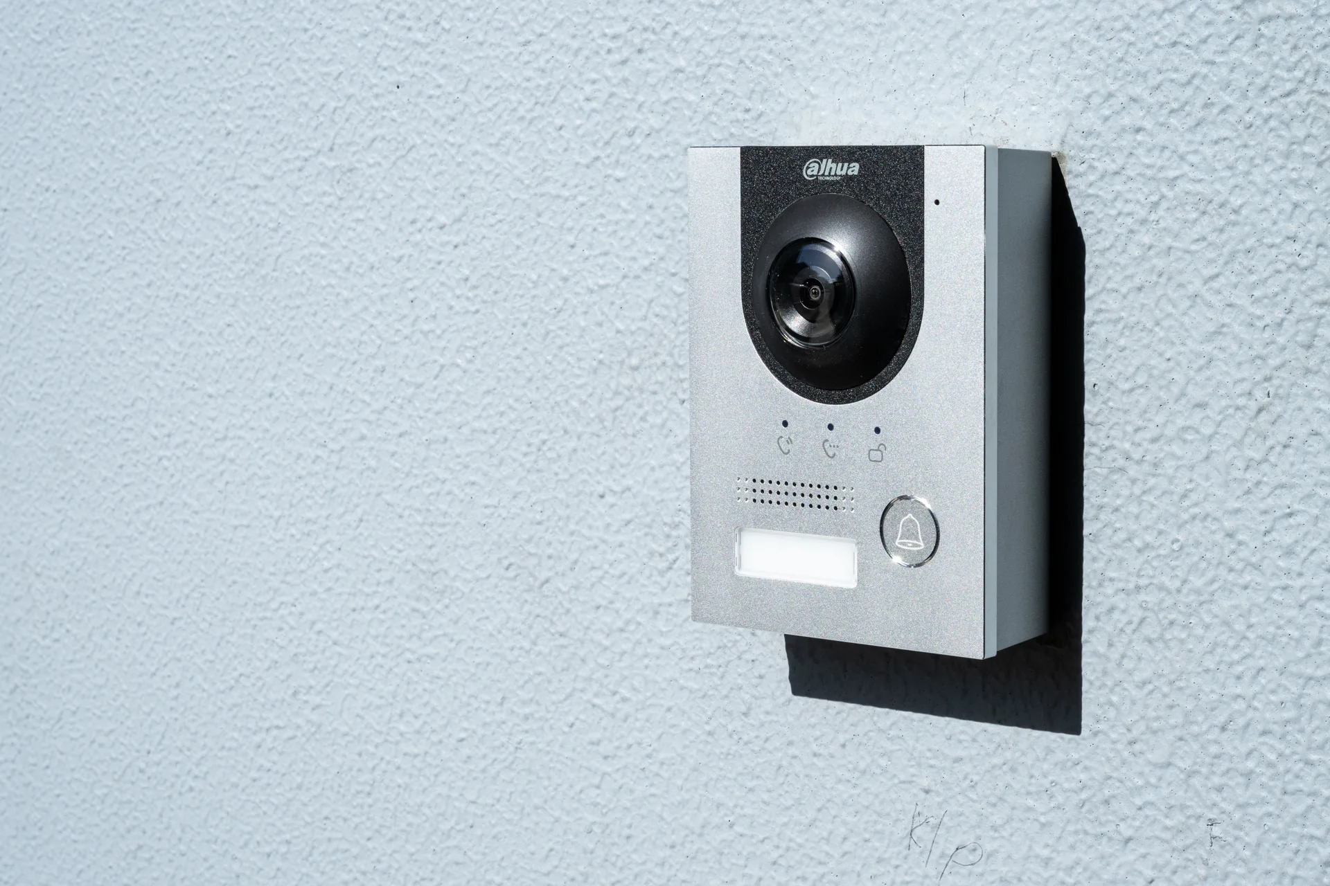 A video intercom doorbell unit mounted at an entry