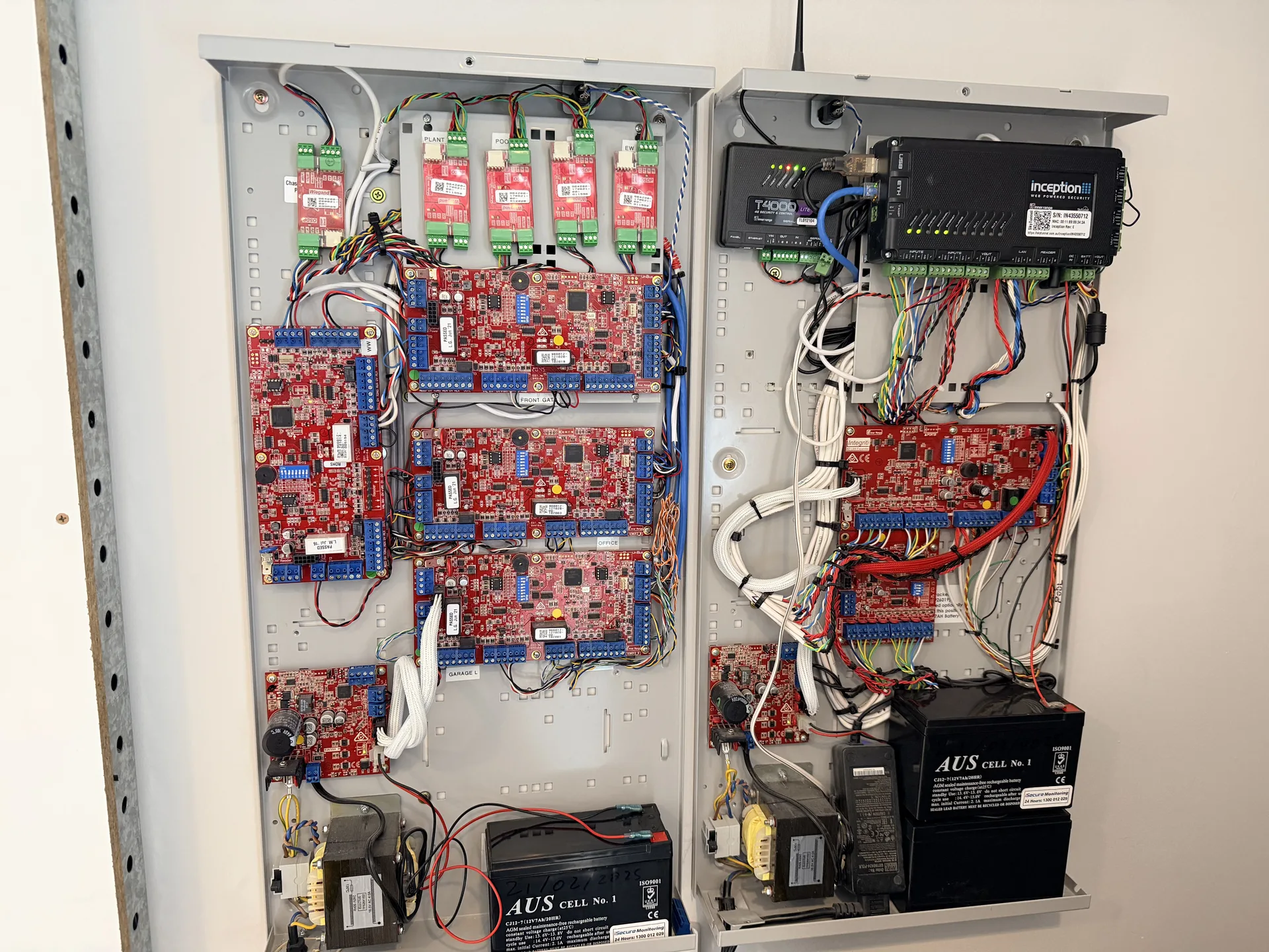 Access control and alarm panels wired and labelled