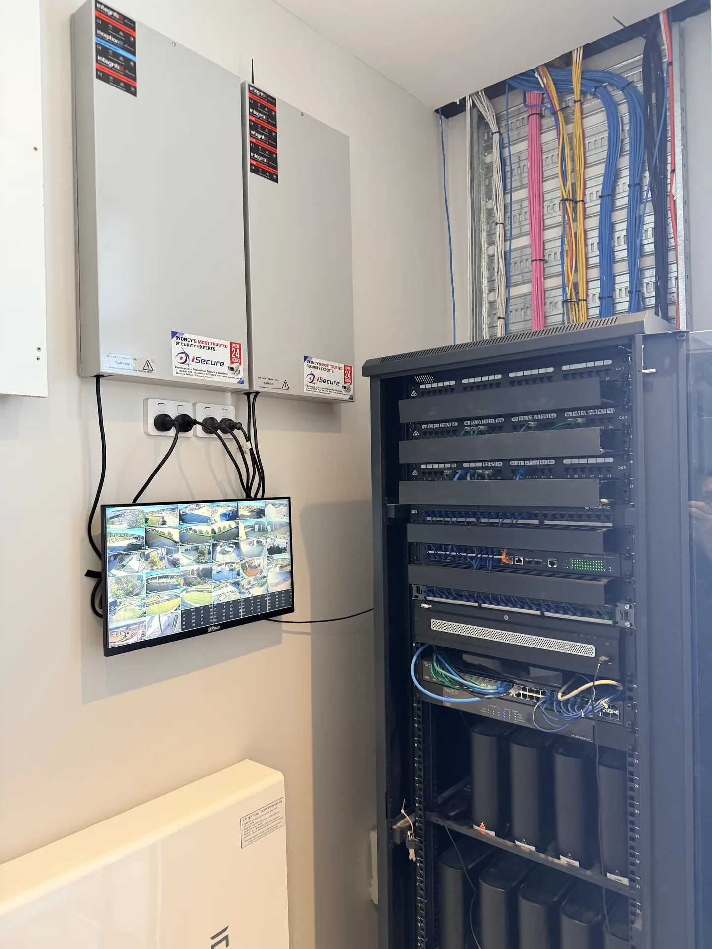 A full rack installation with iSecure enclosures and camera monitor